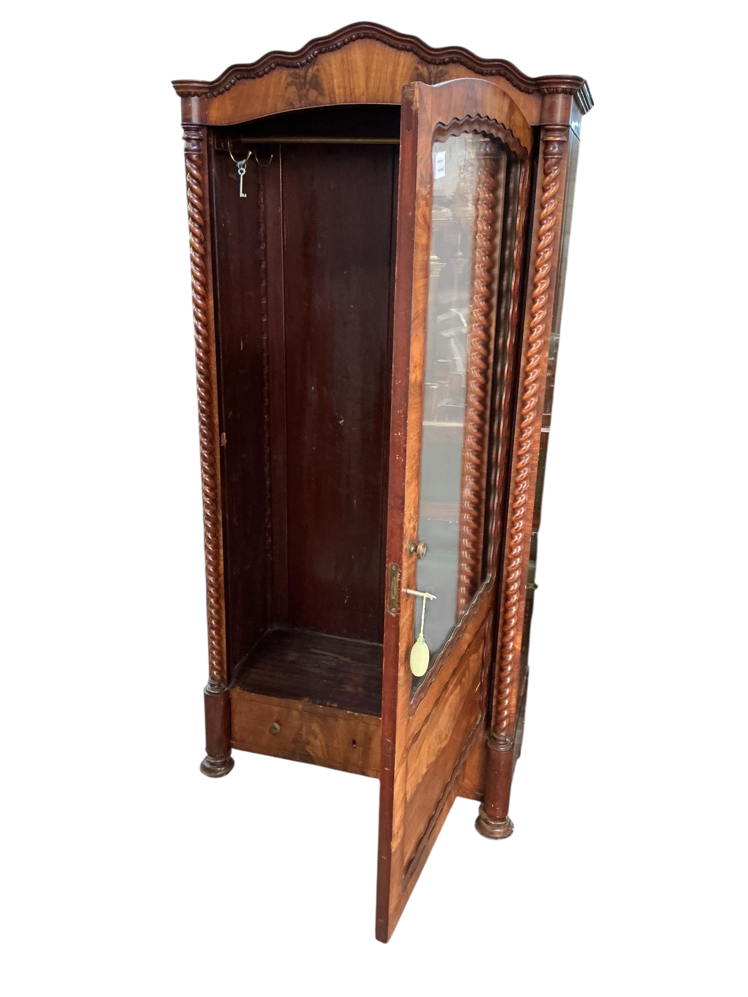 A small 19th century French figured mahogany mirrored armoire, width 80cm, depth 40cm, height 176cm